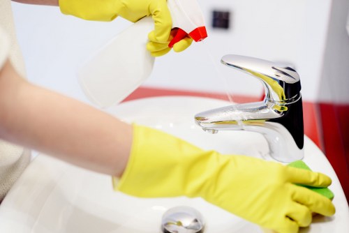 Carpet cleaning technician preparing equipment for a service visit